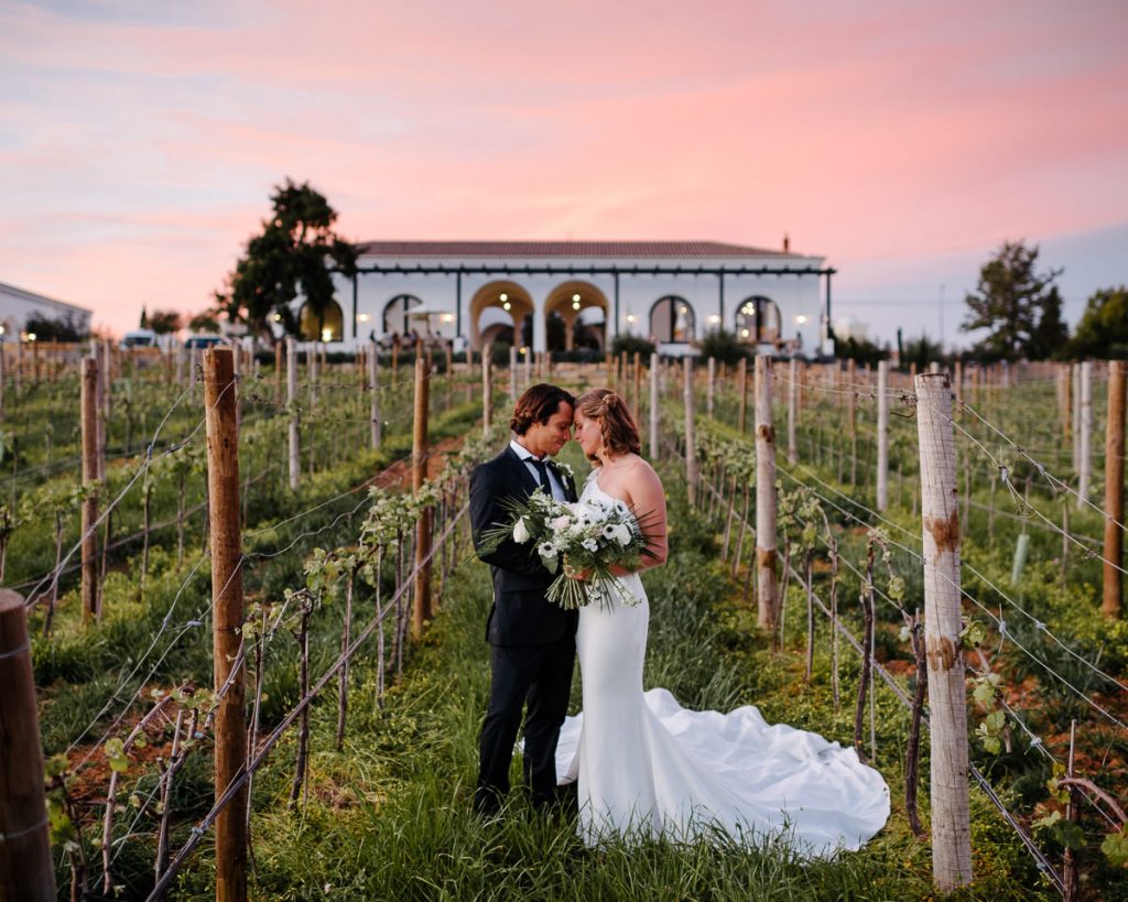 Bride and groom in vineyard of Quinta Dos Santos Algarve Portugal
